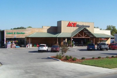 Colony green metal roof awning for an Ace Hardware store