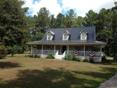 Onyx rib panel metal roofing over a house